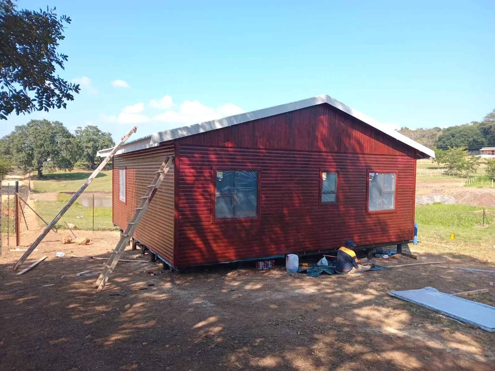 Painted red wooden Wendy house room