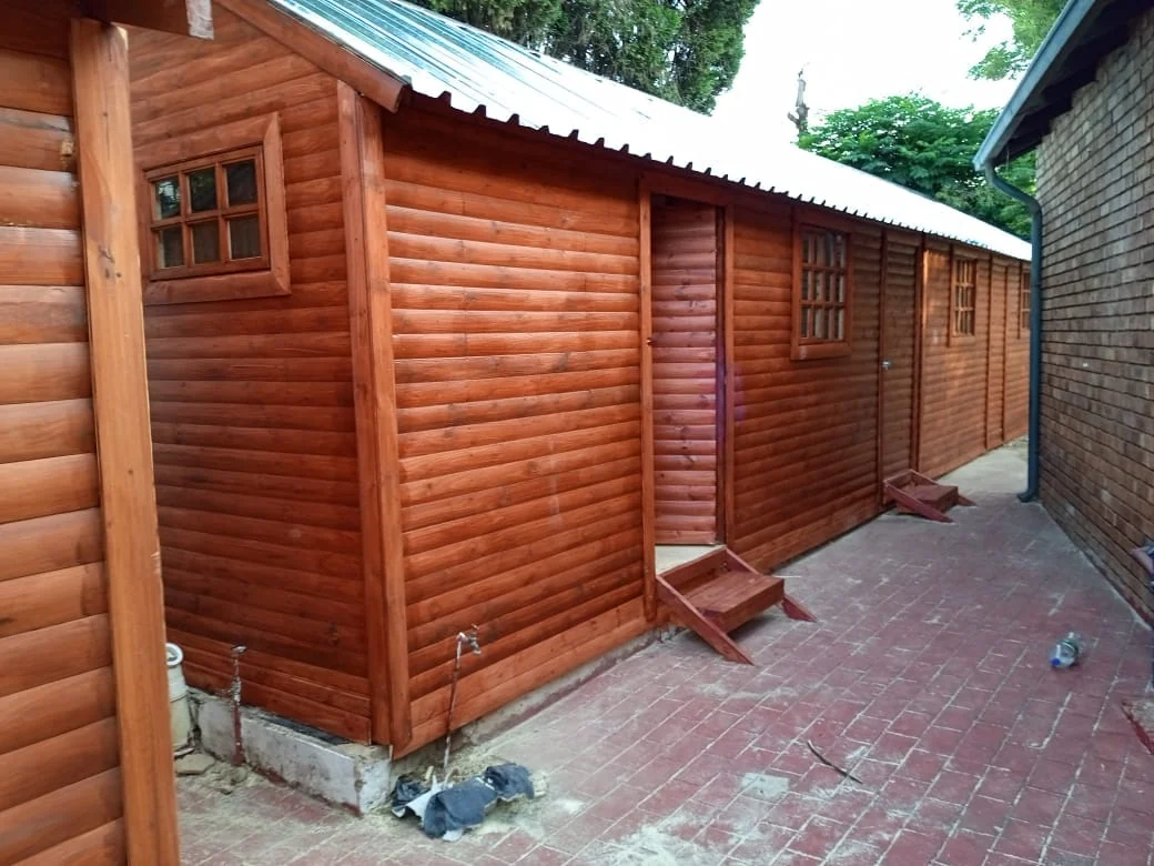 Small wooden Wendy house backyard room