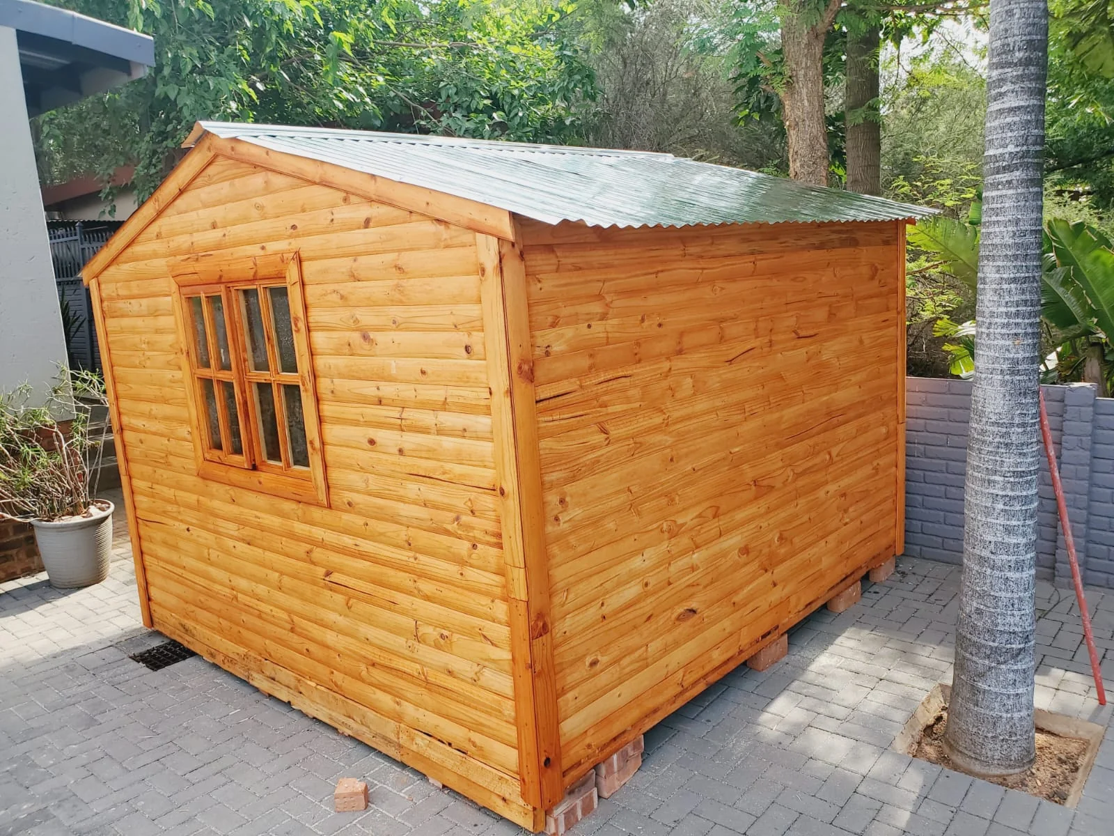 Small wooden Wendy house storage unit